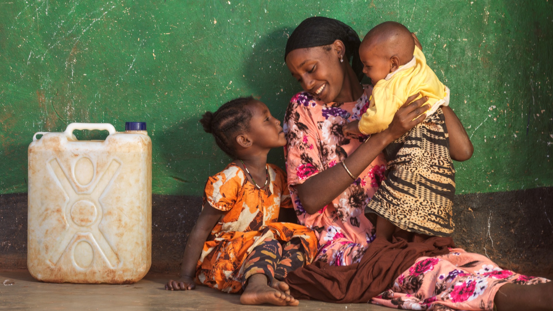 Darmi, 23, with daughters Lelo, 4, and Nadi, 1, at home in Moyale  .